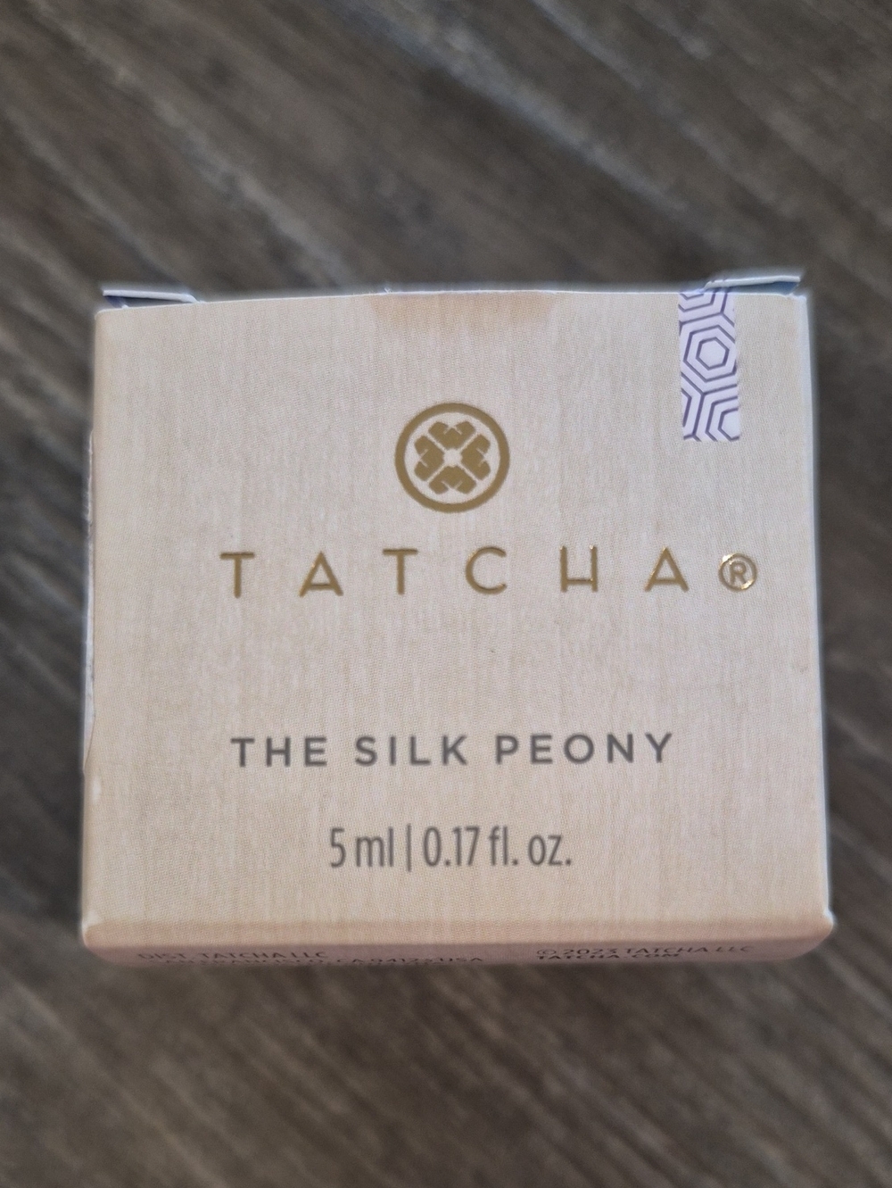 Tatcha The Silk Peony Body Oil — Soft Cream Packaging with Gold Logo